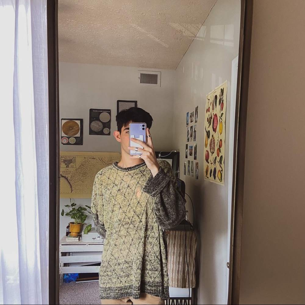 green pullover sweater